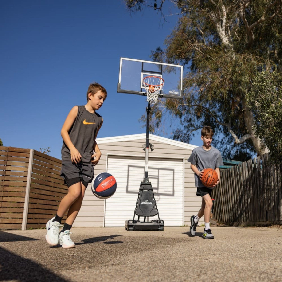 Spalding 60 Inch Acrylic Portable Basketball System