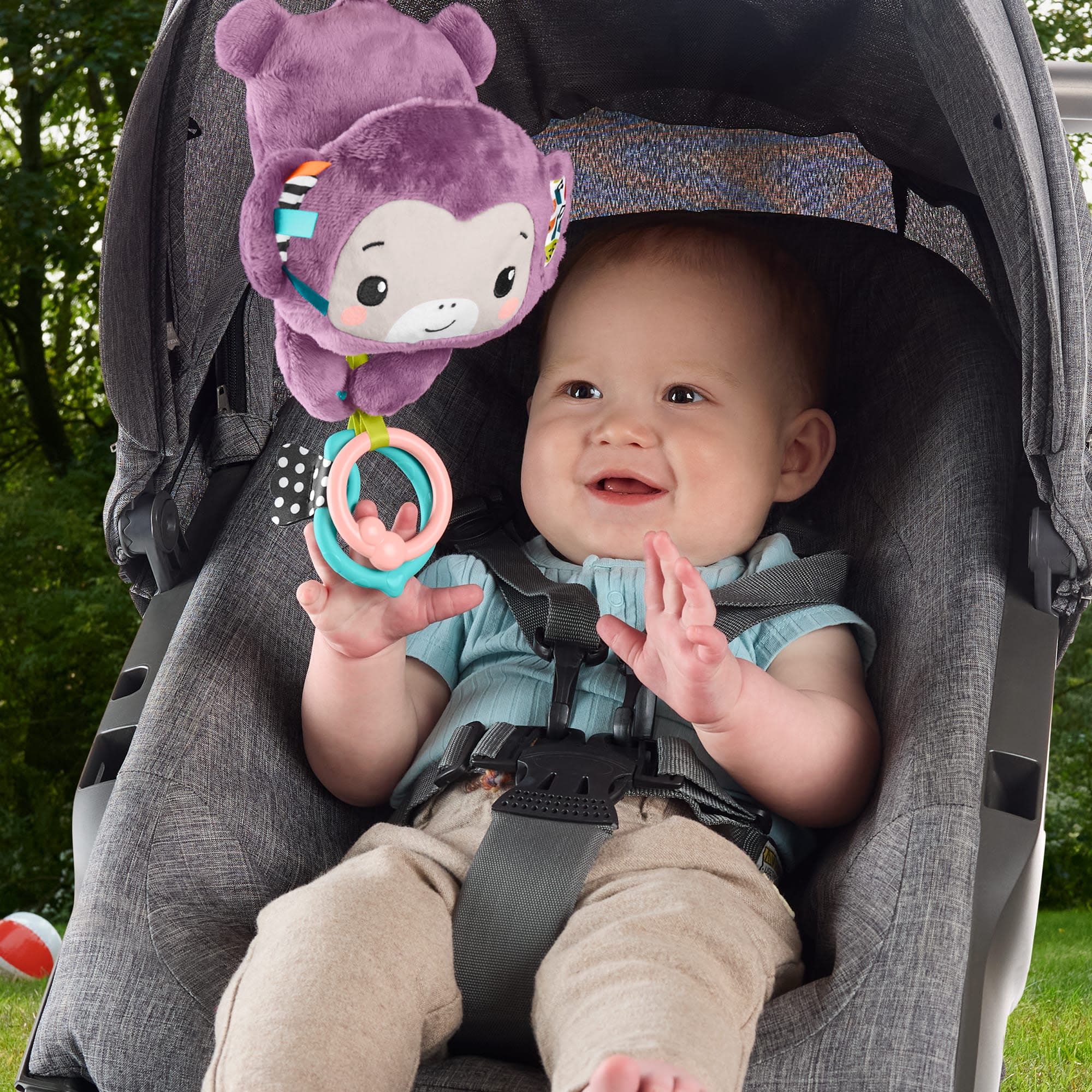 Fisher-Price Sing & Go Purple Monkey Stroller Toy