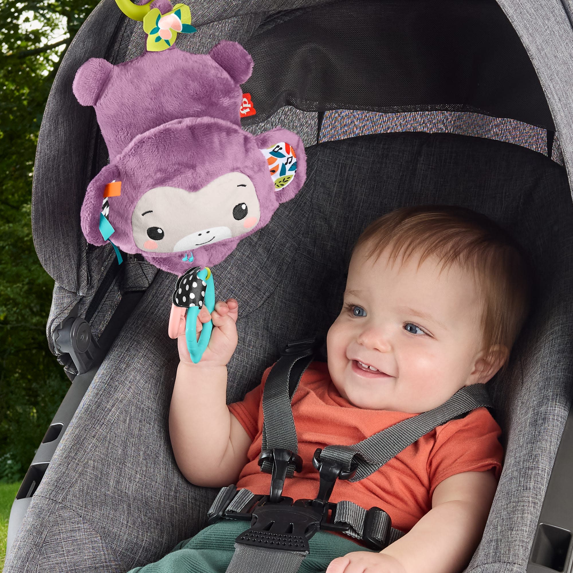 Fisher-Price Sing & Go Purple Monkey Stroller Toy